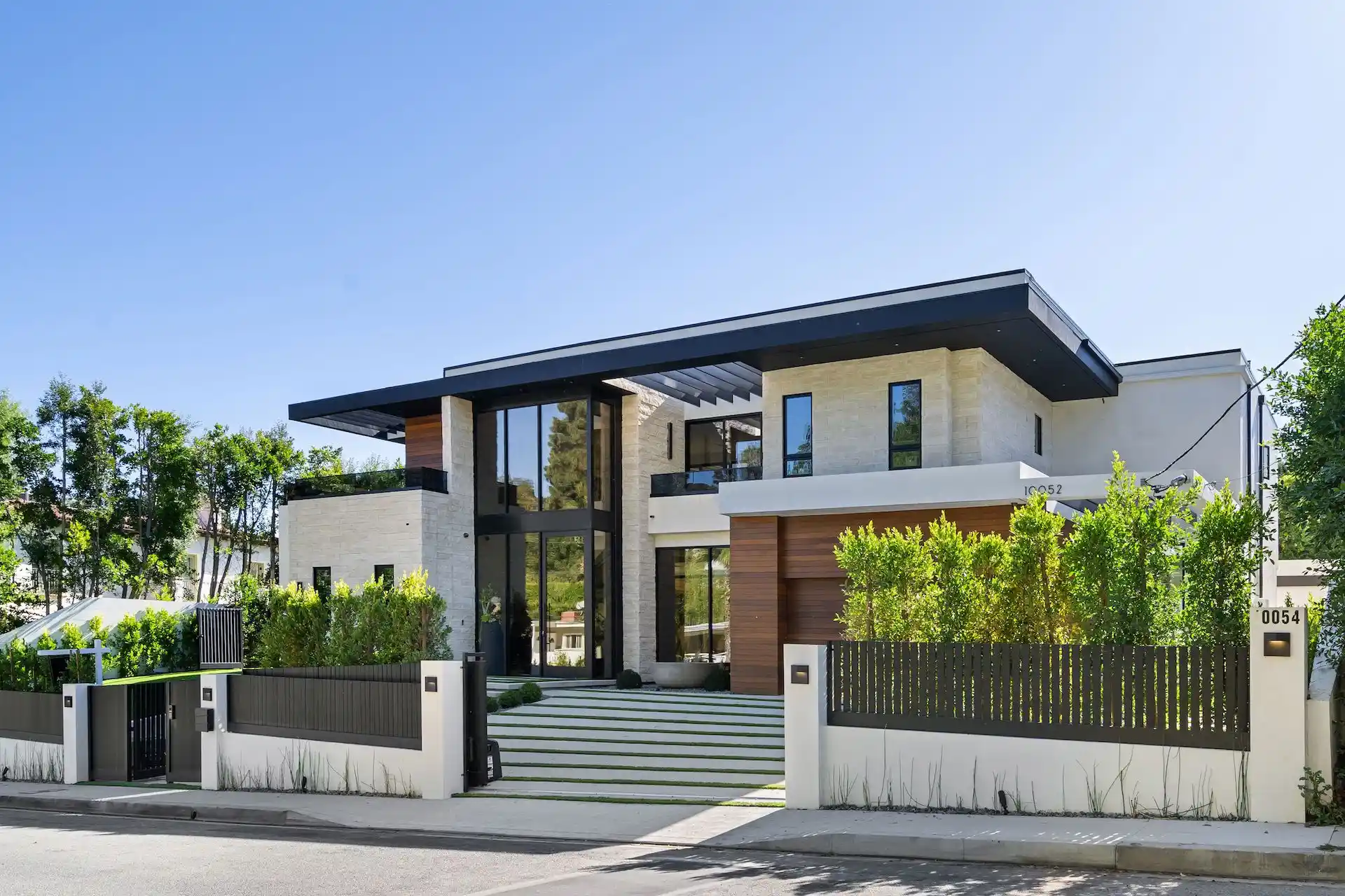 modern-luxury-house-with-landscaped-garden-under.webp